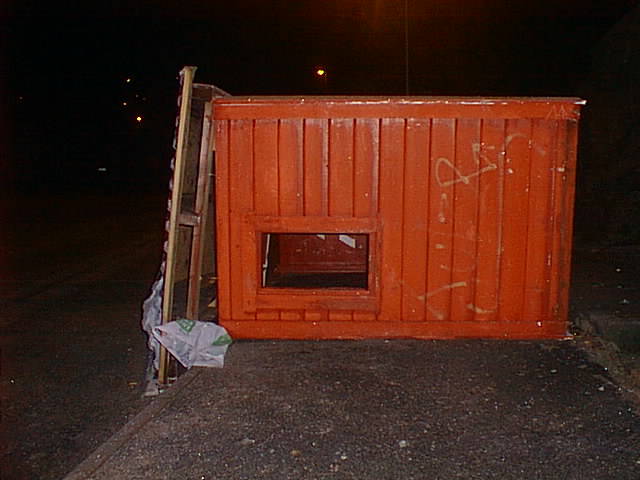 Overturned bus shed