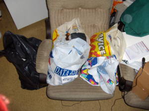 Plastic carrying bags w/ garbage