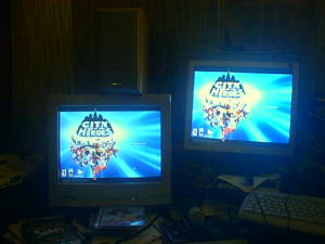 Two monitors in the dark