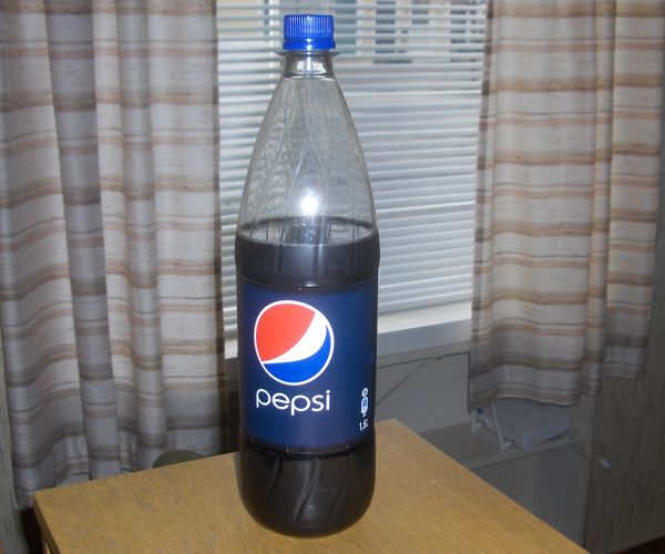 1.5 liter bottle of Pepsi Cola, 3/4 full
