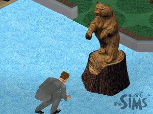 Screenshot, The Sims. Kneeling before a statue.