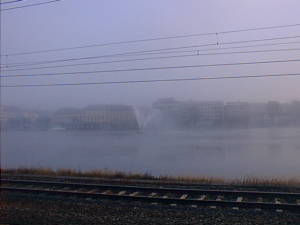 Railway tracks against foggy background