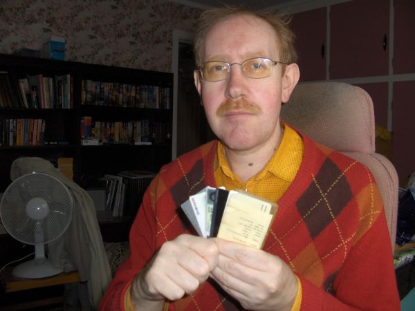 Middle-aged man with electronic cards